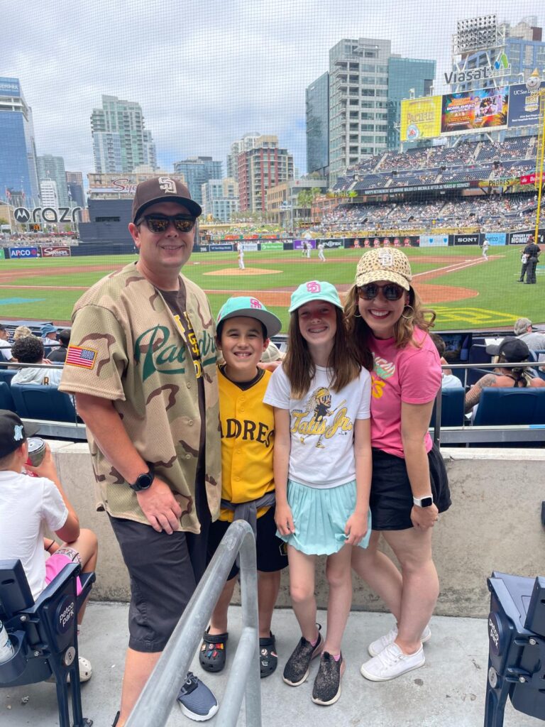 Jeremy and his family at a San Diego Padres game 
